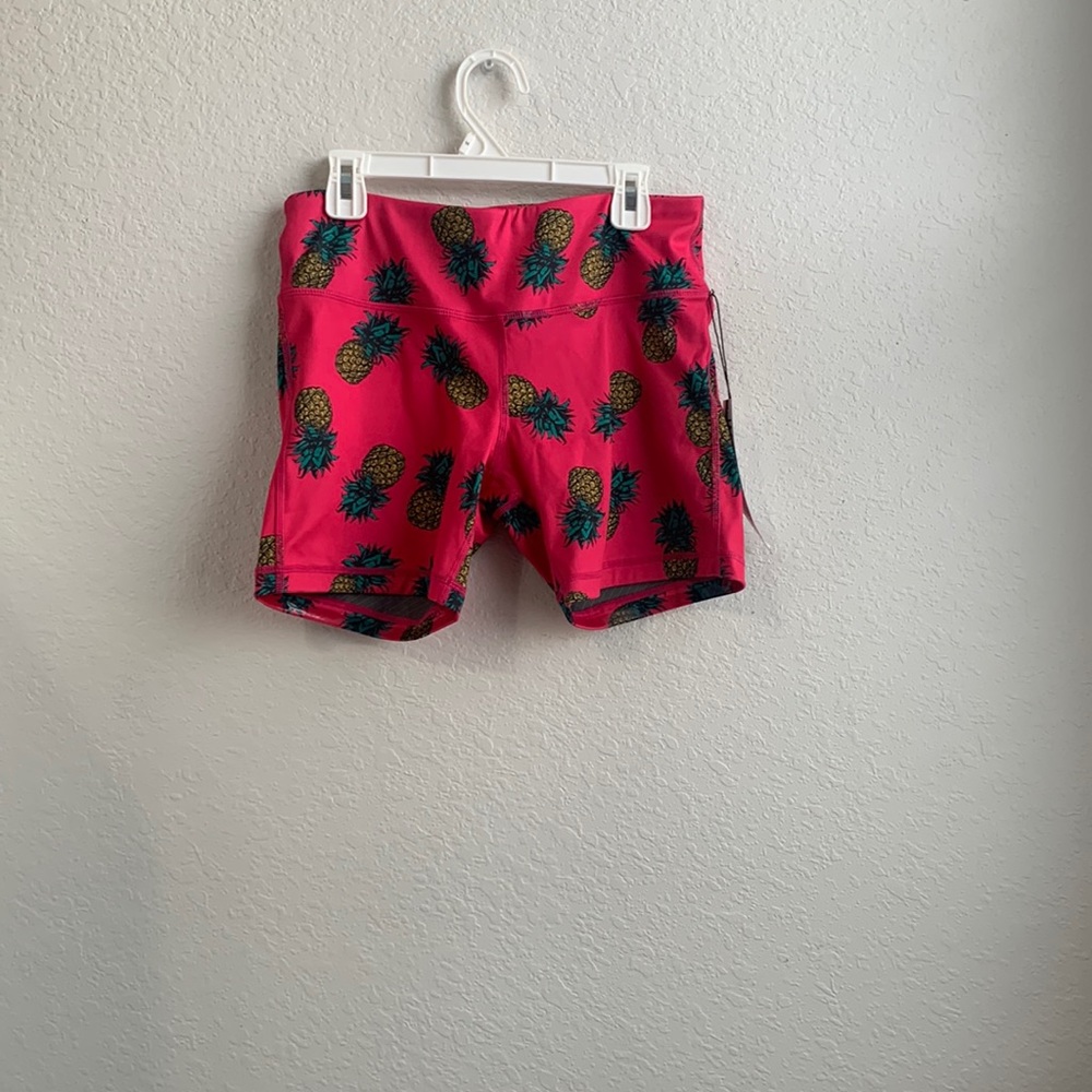 Bike shorts hot pink with pineapples on them